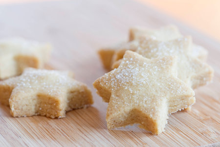 Starshaped Christmas cookies with sugarの写真素材