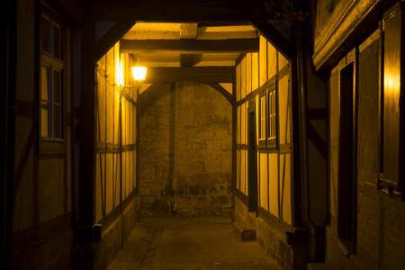 Alleyway in the town of Quedlinburg at night, Germanyの写真素材