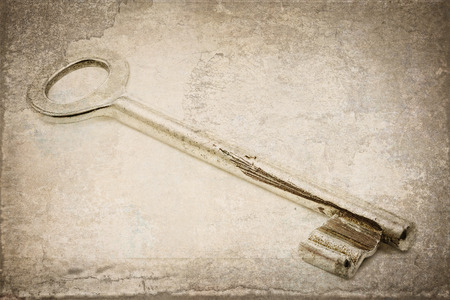 Single old key with texture overlayの写真素材