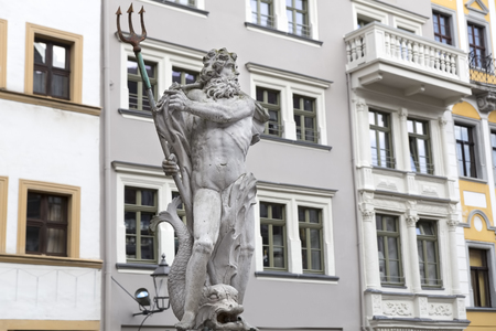 Historic fountain of Neptune in the picturesque town of Goerlitz, Germanyの写真素材