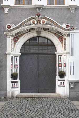 Historic door of a residential home in the town of Goerlitz, Germanyの写真素材
