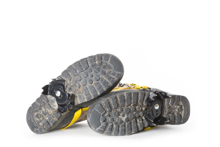 Used hiking boots with Groedel (small crampons)の写真素材