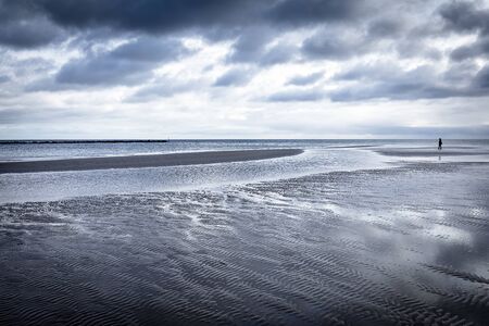 Sandy beach on Ruegen island, Germany, in winterの写真素材