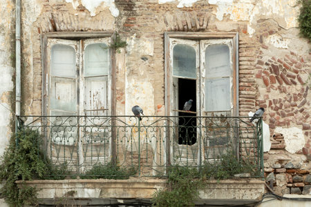 Dilapidated house facade in Beja, Portugalの写真素材