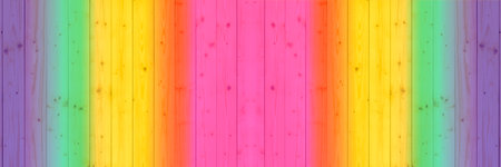Wooden floorboards with rainbow colors as backgroundの写真素材