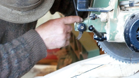 carpenter cutting wooden planks carpenter cutting wooden planksの写真素材