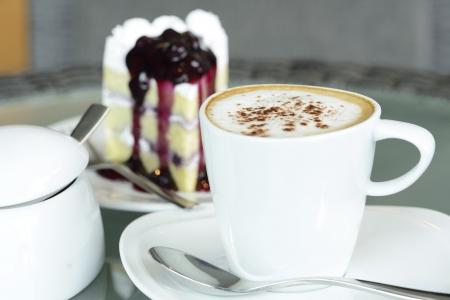 Hot coffee with blueburry cakeの写真素材