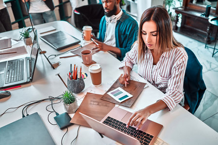 Business people working together in office. People, lifestyle, job, technology and communication concept. Selective focusの写真素材