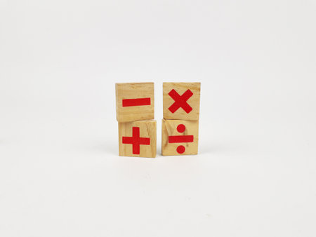 mathematical symbols written on wood and white backgroundの写真素材