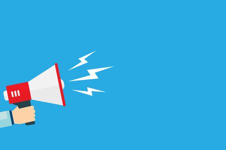 Hand holds megaphone with speech bubble on blue background.のイラスト素材