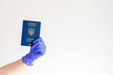 Holding Ukraine passport with white background.の写真素材