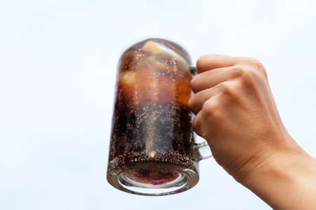 ding a cola cola glass sky backdropの写真素材