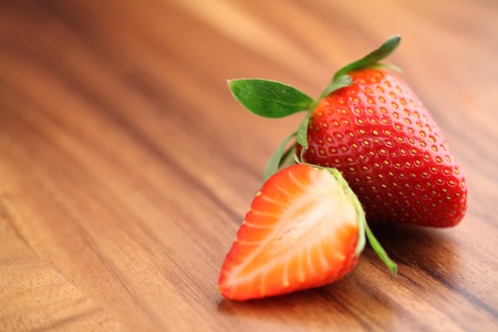 Close-up of strawberries on wood の写真素材