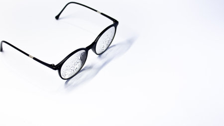 Round Reading Glasses with Slim Black Frame â Isolated on White Backgroundの写真素材