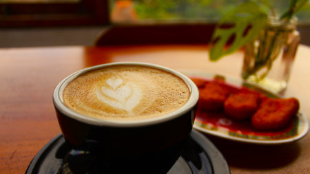 Coffee cup on the table in coffee shop, stock photoの写真素材