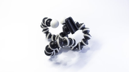 Flexible Mini Tripod â Front Close-Up View on White Backgroundの写真素材