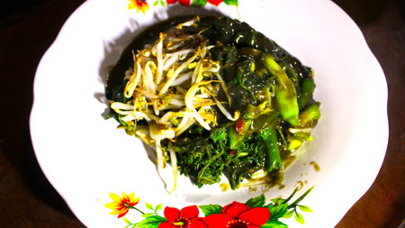 Sayur petis, a traditional Javanese dish rich in flavor, is served with a special petis-spiced sauceの写真素材