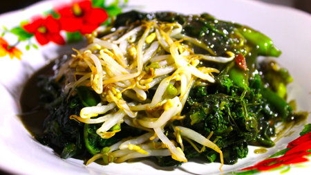 Sayur petis, a traditional Javanese dish rich in flavor, is served with a special petis-spiced sauceの写真素材