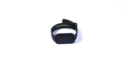 Black smart watch isolated on white background. Black Smart Band Fitness Tracker â Front View on White Backgroundの写真素材