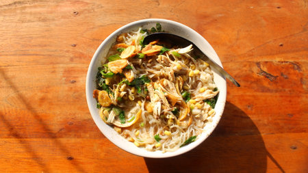 Traditional Indonesian Soto Soup Served in a Bowl