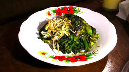 Sayur petis, a traditional Javanese dish rich in flavor, is served with a special petis-spiced sauceの写真素材