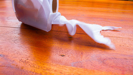 White Tissue Roll on Wooden Table â Minimalist Everyday Objectの写真素材