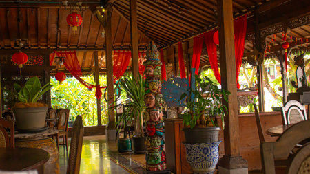 Classic Wooden Restaurant Interior, Rustic and Cozy Ambiance of javaの写真素材