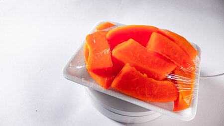 Sliced Papaya in Food Grade Plastic Wrap, Ready to Eat Fruit Packagingの写真素材
