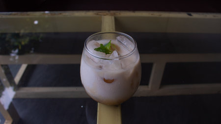 Iced Milk Coffee in a Clear Glass â Refreshing CafÃ© Beverageの写真素材