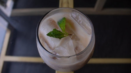 Iced Milk Coffee in a Clear Glass â Refreshing CafÃ© Beverageの写真素材