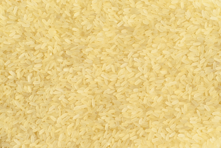 Background of grains of brown rice. Macro.の写真素材