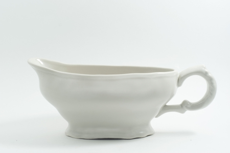 white porcelain sauceboat on a white backgroundの写真素材