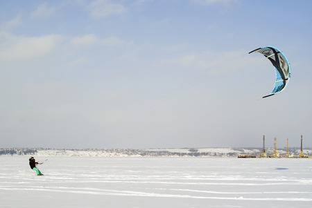 PERM, RUSSIA - FEBRUARY 23, 2018: snowkiter glides on the ice of the Kama Reservoirのeditorial素材