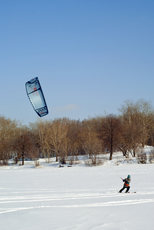 PERM, RUSSIA - FEBRUARY 23, 2018: snowkiter glides on the ice of the Kama Reservoirのeditorial素材
