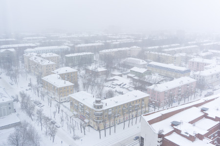 PERM, RUSSIA - MARCH 02, 2018: city blocks during a snowfall, bird's eye viewのeditorial素材