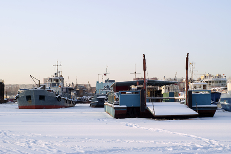 different river technical vessels during wintering in the backwatersの写真素材