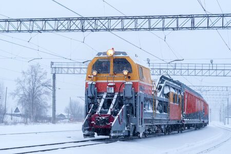 Perm, Russia - January 05, 2019: railway snow removal train for cleaning station tracks and turnouts...