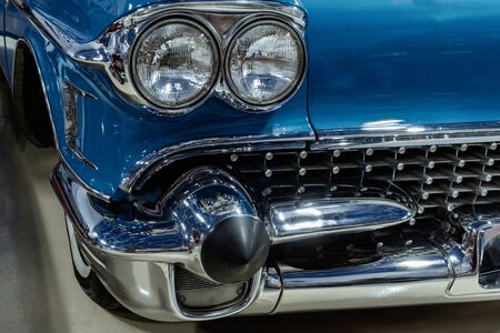 Yekaterinburg, Russia - January 16, 2019: fragment of the front of a blue vintage car