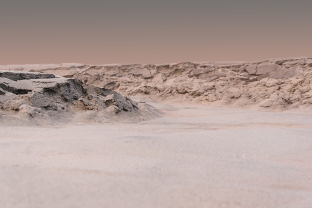 background, landscape - martian terrain with traces of fluids on the surface during a dust stormの写真素材