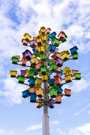 Perm, Russia - August 04, 2019: art object tree of birdhouses against the skyのeditorial素材