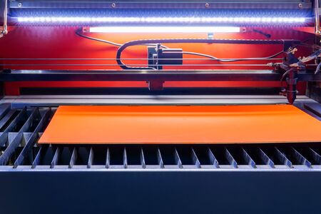 machine for laser cutting of wood before working with plywood blank