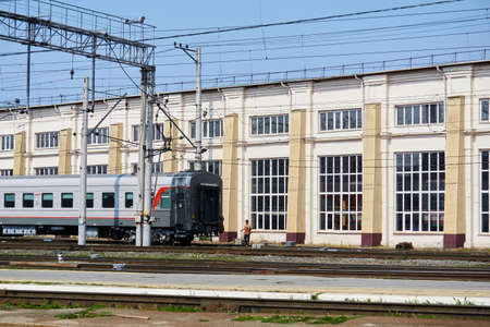 Perm, Russia - August 07, 2020: shunting work with passenger cars against the background of the...