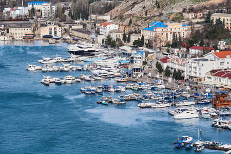 Sevastopol, Crimea - February 02, 2021: winter view of the harbor in Balaklava Bayのeditorial素材