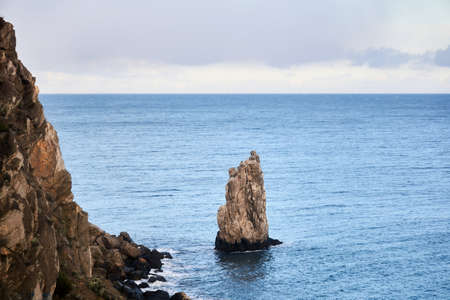 seascape with steep inaccessible coastal cliffsの写真素材