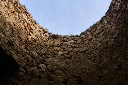 sky view from a dungeon with stone walls