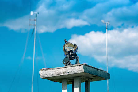 spherical glass meteorological sunshine recorder (heliograph) at the weather station against the skyの写真素材
