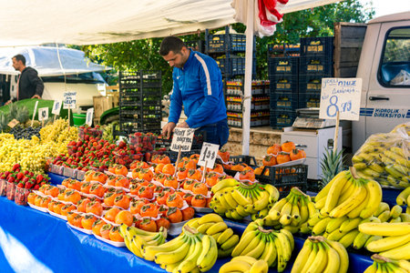 Kemer, Turkey - November 08, 2021: fruit merchant at a local bazaarのeditorial素材