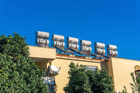 solar thermal water heating collector mounted on the roof of the house