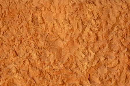 texture of a natural roughly cut stone of some ancient building