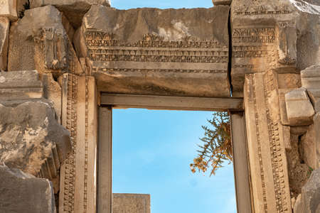 stone portal of an antique building in the ruins of the ancient city of Myra, Turkeyの写真素材